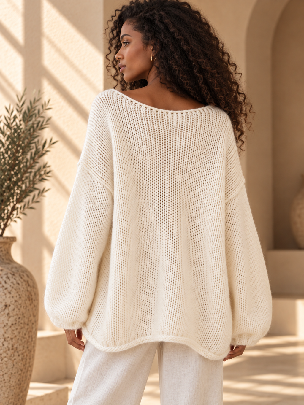 Women’s Hollow-Out Side-Slit Knit Sweater